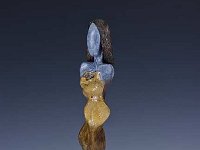 Emergence  Granite, Apoxie and tree root on a white Corian base 15 x 5 x 5 inches   $650.00