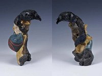 Growth  Built around a tree root the figure of an earth mother, growing from bedrock, winds around the form in a clockwise direction culminating in the head of a raven. The hair of the figure forms the bird's wing thus incorporating the Celtic concepts of shape shifting, reincarnation and cycles of regeneration as embodied in the triple goddess "The Morrighan". 10 x 5 x 4 inches   $575.00